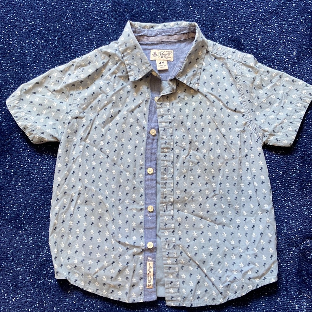 Boys button up shirt size 4. Blue with penguins and palm trees